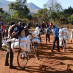 MCC Malawi Loading up at Mulanje distribution point for delivery to villages-lpr