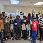 Portland immigrants wiith supplies