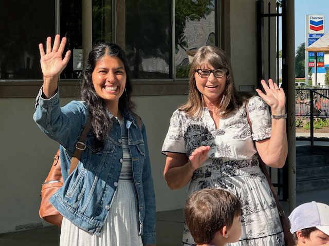 Dinuba women waving