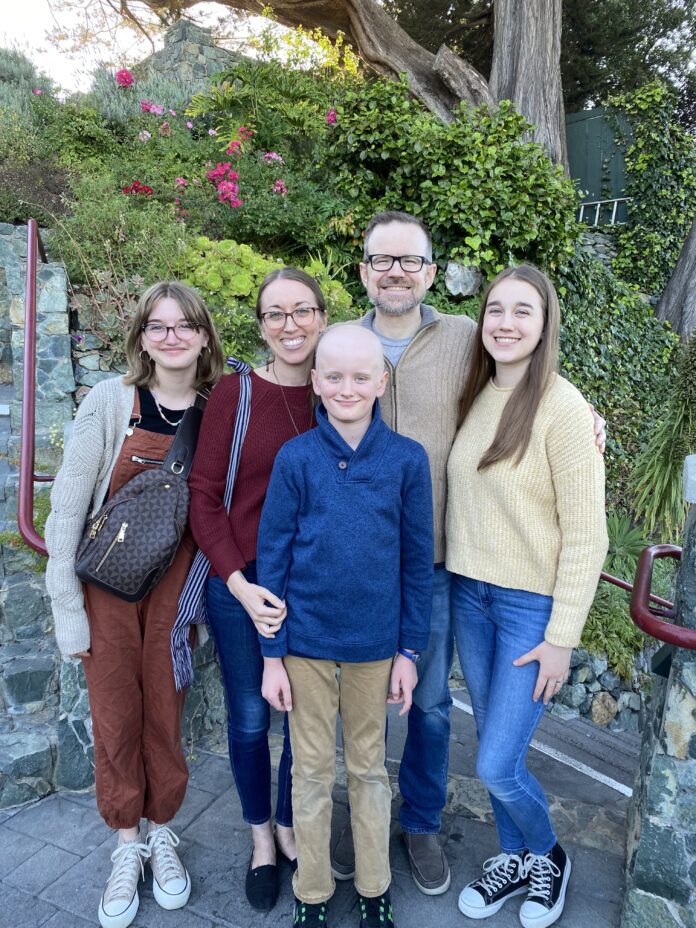 Family of five - husband, wife, two daughters and one son.