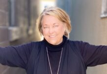 5 minutes with Diane Andrews Woman in black sweater and blouse smiling.