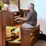 Man playing organ