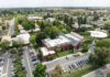 Fresno Pacific University receives $10 million grant from Lilly Endowment Drone view of college campus buildings, parking lot, surrounding area.