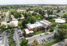 Fresno Pacific University receives $10 million grant from Lilly Endowment Drone view of college campus buildings, parking lot, surrounding area.