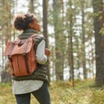 Young Woman with Backpack Outdoors